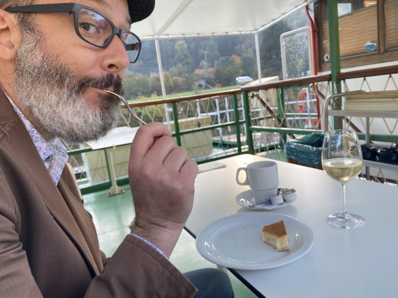 Enjoying his cheesecake