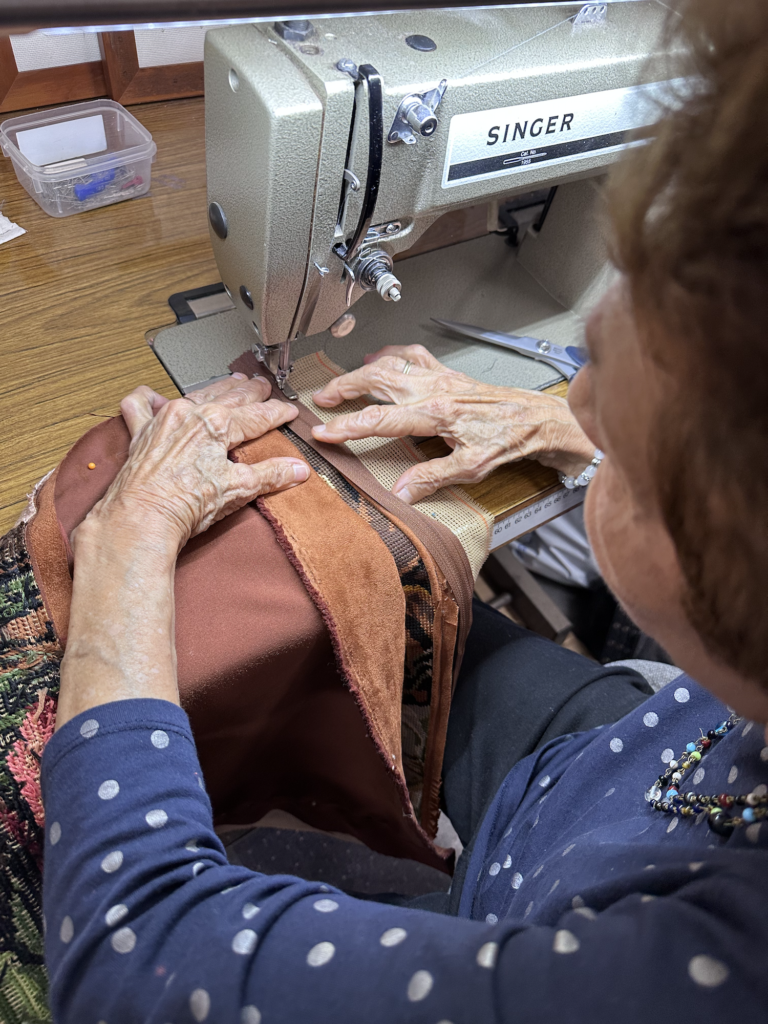 Mrs. M sewing a zipper