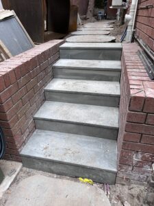 Front steps with new bluestone cladding