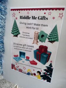 Riddle Me Gifts sign