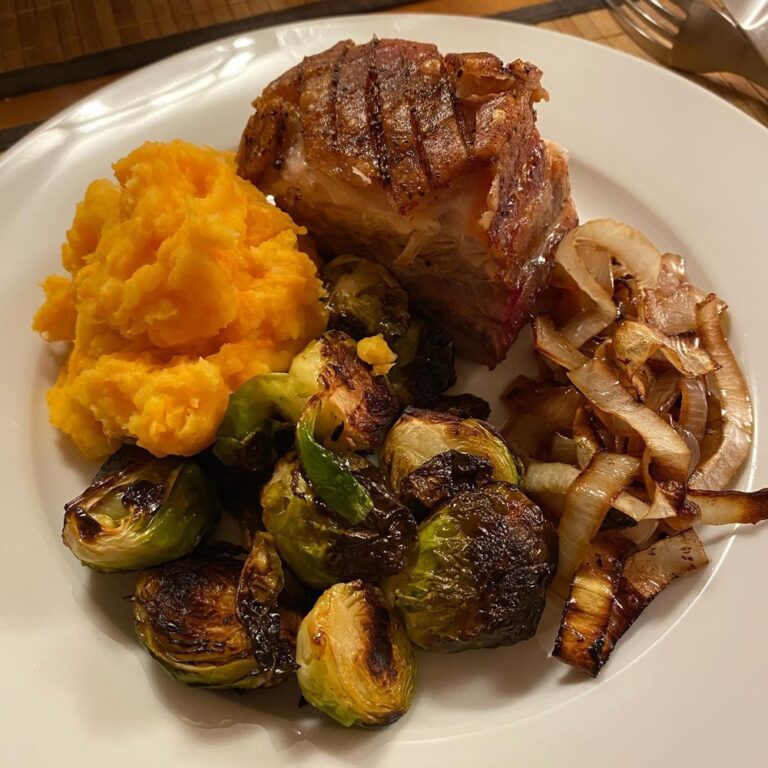 Autumnal dinner of pork belly (with damn nice cracklin’), roast onions, pumpkin mash, and Brussels sprouts. 😍🍁 All made by the Snook…