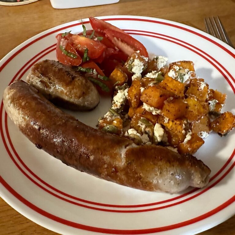 Dinner tonight: pork sausage, tomato basil salad, and roast sweet potato with feta and pepitas…