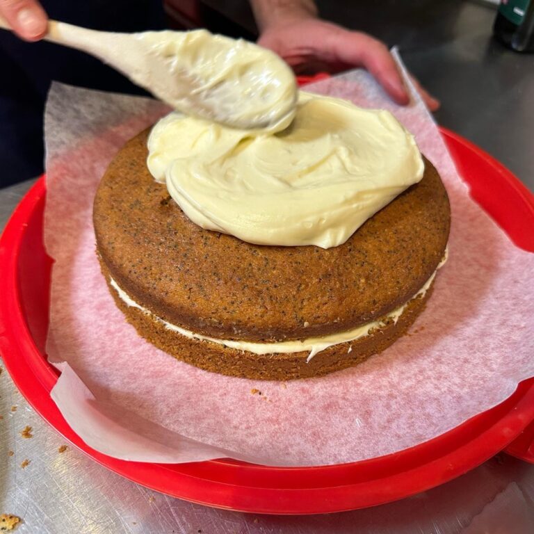 Citrus Poppyseed Cake with Lemon Cream Cheese frosting, made by the Snook. And I got to lick the spoon! 😂❤️