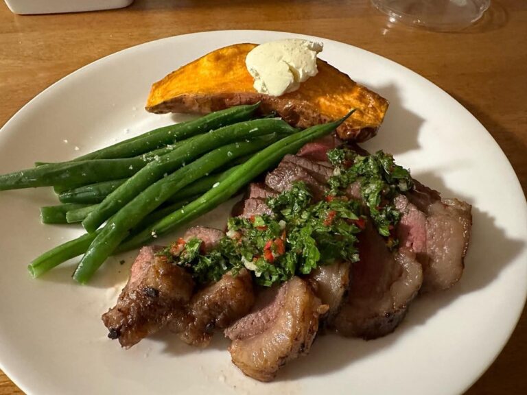 Picanha steak with homemade chimmichurri, green beans, and baked sweet potato. ❤️ He feeds us so well!