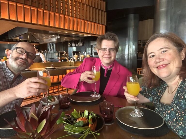 Our nephew @kurt_sss is visiting for the holidays so we caught up for a very beautiful Christmas Eve brunch at @woodcutrestaurant. We even had a visit from Santa! ❤️🎅🥂 (Outfits: mine is a @made590 Vera in @riflepaperco fabric; Kurt’s is the @barbie Double-Breasted Suit from @zara.)