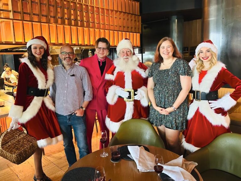 Our nephew @kurt_sss is visiting for the holidays so we caught up for a very beautiful Christmas Eve brunch at @woodcutrestaurant. We even had a visit from Santa! ❤️🎅🥂 (Outfits: mine is a @made590 Vera in @riflepaperco fabric; Kurt’s is the @barbie Double-Breasted Suit from @zara.)