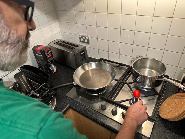 Unexpected pleasures of the new apartment: getting a glimpse of the Harbour Bridge and Opera House from the train on my commute, and the Snook charring tomato skins on the gas stovetop…