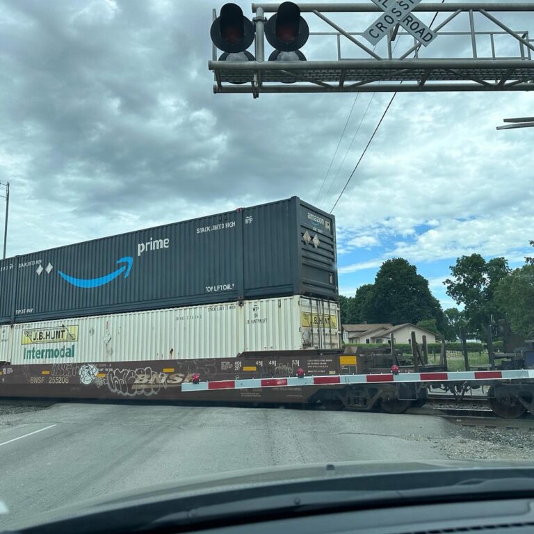 Summer in the Midwest. Cornhole, freight trains, carbs, and softball… ❤️