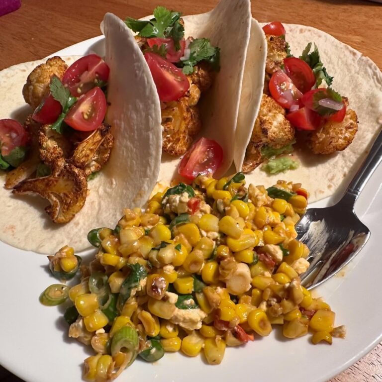 Spicy cauliflower tacos with street corn salad, courtesy of the Snook. 🌮❤️ #meatlessmonday