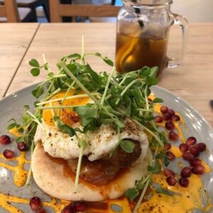 Dinner - “kimchi flatbread” with bacon, egg, bratwurst, and pomegranate?! Tasty but confusing. https://t.co/pGHji9mQLD https://t.co/C6AP5gkHau