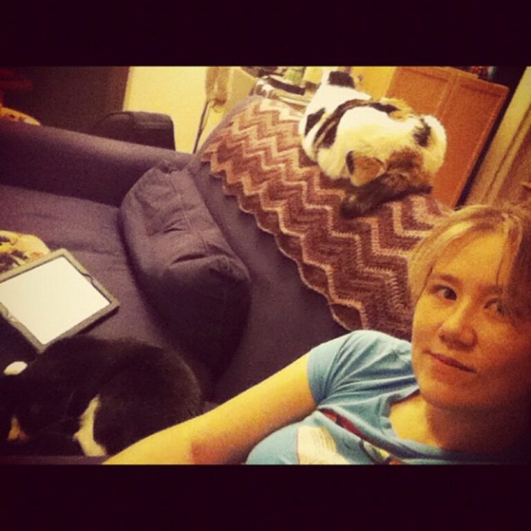 Self-portrait with two cats and an iPad. Life is good.