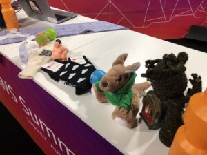 Decorated the #AWSsummit #summitlivesydney booth this morning. My contributions: Queen Amidala phone, knitted QR code mittens (by me) @KnitYak scarf, and crocheted Baby Groot (from @RoseRed_Shoes). https://t.co/Kv6u2VkEfv