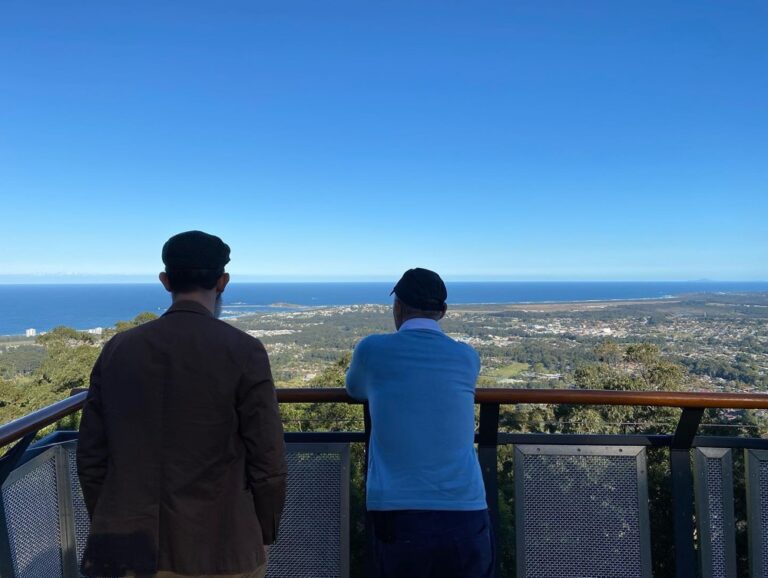 A man and his Pop, on top of the world.