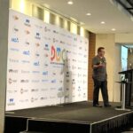 Next up is @grant_simonds from setting the scene for a big challenge - transforming a lumbering monolith into a modern microservice-based architecture for the @Telstra TV box. It’s always great to hear real stories from local experts! #dotc19 #dotc https://t.co/MxMeNBmbYu