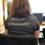 Thrilled to finally get to rock an @awscloud Inclusion Ambassador shirt after being jealous of @glenngore’s! (Note to future self: make sure hair is smooth before someone takes a photo from behind... 🙃) https://t.co/jV2YznJ2EJ