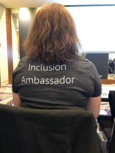 Thrilled to finally get to rock an @awscloud Inclusion Ambassador shirt after being jealous of @glenngore’s! (Note to future self: make sure hair is smooth before someone takes a photo from behind... 🙃) https://t.co/jV2YznJ2EJ