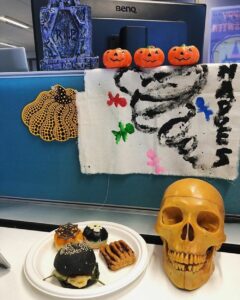 Still life: “Halloween Vanitas.” Celebrating the transience of life, the certainty of death, and the tasty, tasty messiness of black iced doughnuts. https://t.co/vLBXXOhh34 https://t.co/Yh9RiVT9w9