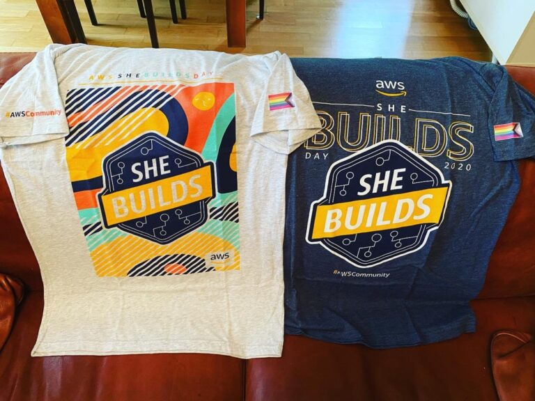 Came home to find a package waiting - new #shebuildsonaws shirts! ❤️ Love the design; love the flag on the sleeve; loved the message behind it all. #awscommunity #bepeculiar