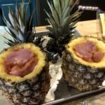 Step 3: stuff the marinated pork tenderloin into the pineapple. (Technically this is Step 4, but we got overexcited to see if it would fit.) #swineapple 🐷🍍 https://t.co/vzG0IBIudc