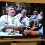 Ten minutes in and we have problematic topless African dancers, Dr. Who, and BRIAN BLESSED with a blond pageboy wig. https://t.co/82W3MHpnSf