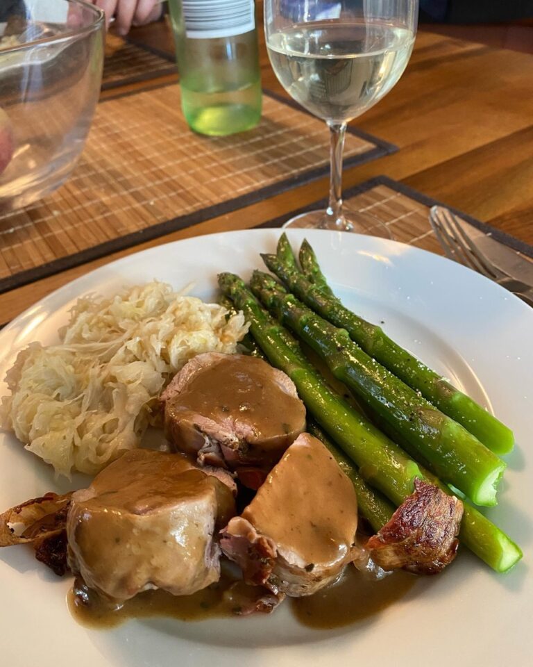 Bacon-wrapped pork loin, asparagus, and sauerkraut made by the Snook. 🥰 #spargelzeit