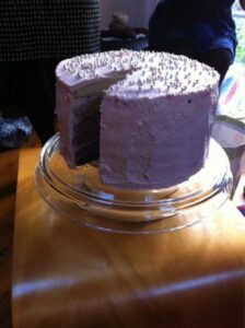 RT @randomknits: Baby shower layer cake! http://t.co/cr1vzjmL // 6 layers of purple cake, and I ate it. #sugarcoma