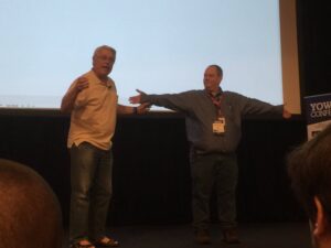 Not super sure where @unclebobmartin is going with this tale of Earth’s history… but it’s fun watching @smithcdau hold his arms out. #yow16 https://t.co/8dol7bMmUc