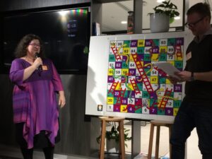 Last talk of the night: @knitterjp and Josh McKenzie talking about mentorship… and Snakes and Ladders. 😂 🐍 #GGDSyd @ofx https://t.co/XBpOvUdzdv