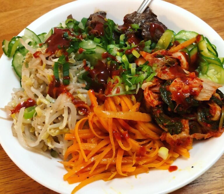 Continuing to perfect my Bibimbap! Rice, beef, bean sprouts, cucumber, zucchini, carrot, and kimchi... ❤️