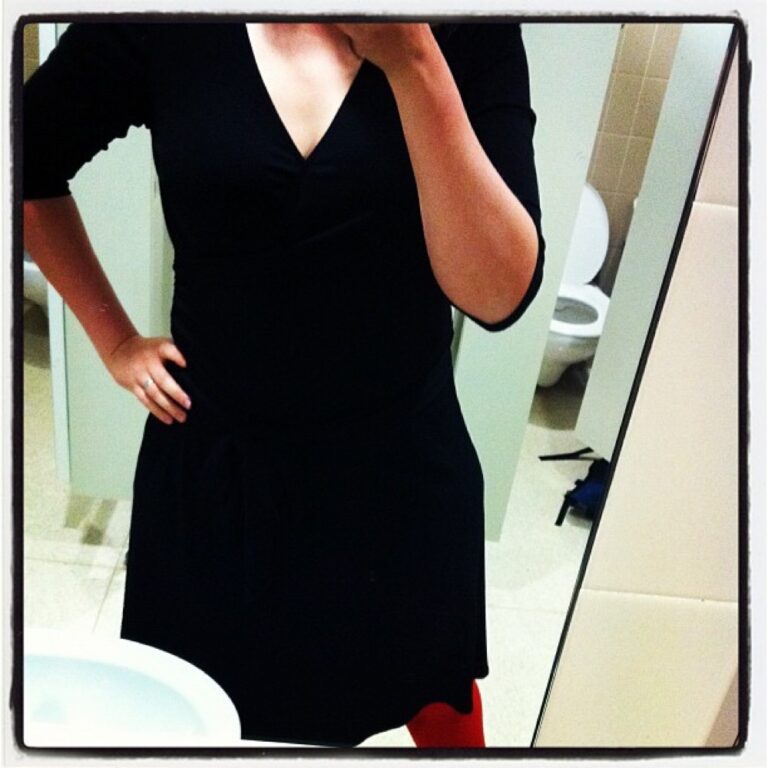 Frocktober day 1: Black wrap dress, orange tights.