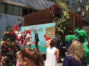 A dinosaur looks on while Santa kicks off the Christmas season in Brisbane. (Poor Santa must be sweating!) ☀️🎅😰 https://t.co/M4qp95SVtc https://t.co/rLIqfYPRiB