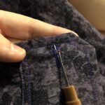 Step 24 - cut open buttonholes. https://t.co/MErdSMs52H