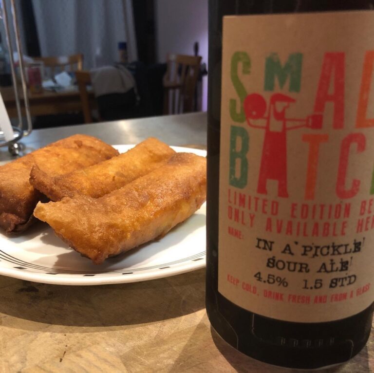 Cheeseburger spring rolls and sour pickle beer!