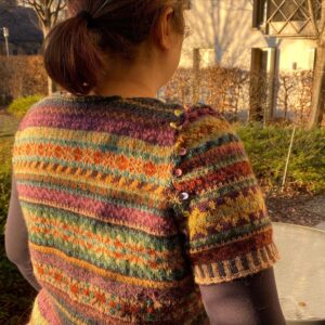 Trial sleeve. I think the shaping & size are pretty good. The problem is that the motifs are matching up too closely across the seam. I think I want to shift the sleeve pattern so they’re farther apart...