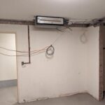 Week 5: Not a lot of visible progress. They poured a leveling compound to help smooth out some of the dips in the floor, which took a while to set. They also removed the old A/C and started installing the new units. They’re also building in a bulkhead for the new kitchen pass lights. 🏠 #renovation