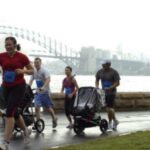 Me blowing past a couple guys with strollers in the Mother's Day Classic 8K.