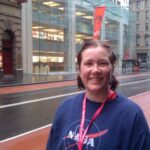 After the Mother's Day Classic, waiting for the bus on George Street... in the rain. I met my goal of running the whole 8K without stopping in under an hour!