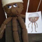 My original knitted toy for this year's Sydney Royal Easter Show knitting competition: "Albert the Magic Pudding." Based on the book and watercolour by Norman Lindsay.