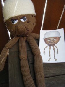 My original knitted toy for this year's Sydney Royal Easter Show knitting competition: "Albert the Magic Pudding." Based on the book and watercolour by Norman Lindsay.