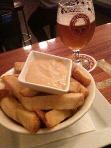 Piping hot carbs, fat, aioli, and beer. The cure for a cold winter's night.