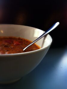 Hearty Pumpkin Chili Using pumpkin instead of kidney beans gives it a smoother texture and lowers the carb count. If you use kangaroo instead of beef mince, you also reduce the fat! The perfect warming dish on a cold autumn night. 500g mince (beef or kangaroo) 1 large onion, chopped 1 capsicum, chopped 1-2 garlic cloves, minced 1 can diced tomatoes (or use fresh!) 1 cup diced pumpkin 1 Tbsp chili powder 1 tsp cumin 1/2 tsp dried basil, crushed salt pepper In a large saucepan, cook the mince, onion, capsicum, and garlic til the meat is brown and the onion is tender. (If you need to, drain any excess fat or water at this point.) SLOW COOKER: Put the meat mixture along with the tomatoes, pumpkin, chili powder, cumin, and basil into your slow cooker. Give it a stir, then put it on low for 8-10 hours (or high for 4-5 hours). Salt and pepper to taste. STOVE TOP: Add the other ingredients to your meat mixture and bring to boiling. Reduce heat and cover. Let it simmer for about 20 minutes or until the pumpkin is the texture you like. Salt and pepper to taste.