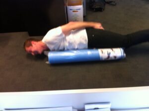 My new foam roller has arrived! @seanchadwick immediately had to try "planking" on it.