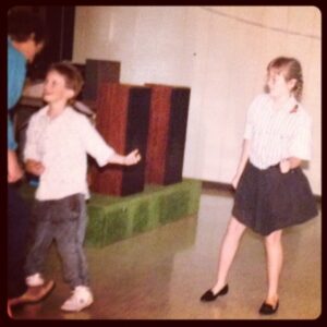 People are passing photos at the funeral. Here's 13yo me cutting a rug at their wedding reception.