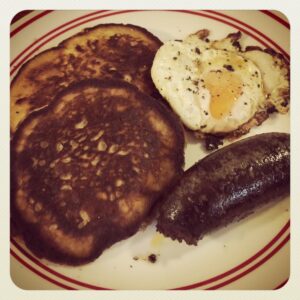 For his home-cooked birthday dinner, he wanted brekkie. Pancakes, fried egg, and black pudding.