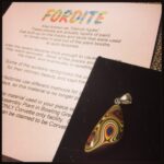 Yay! I finally have my very own piece of Corvette Fordite. Lovely metallic flecks. :)