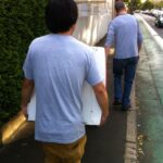 Manly men moving a fridge. I feel a Dire Straits song coming on...