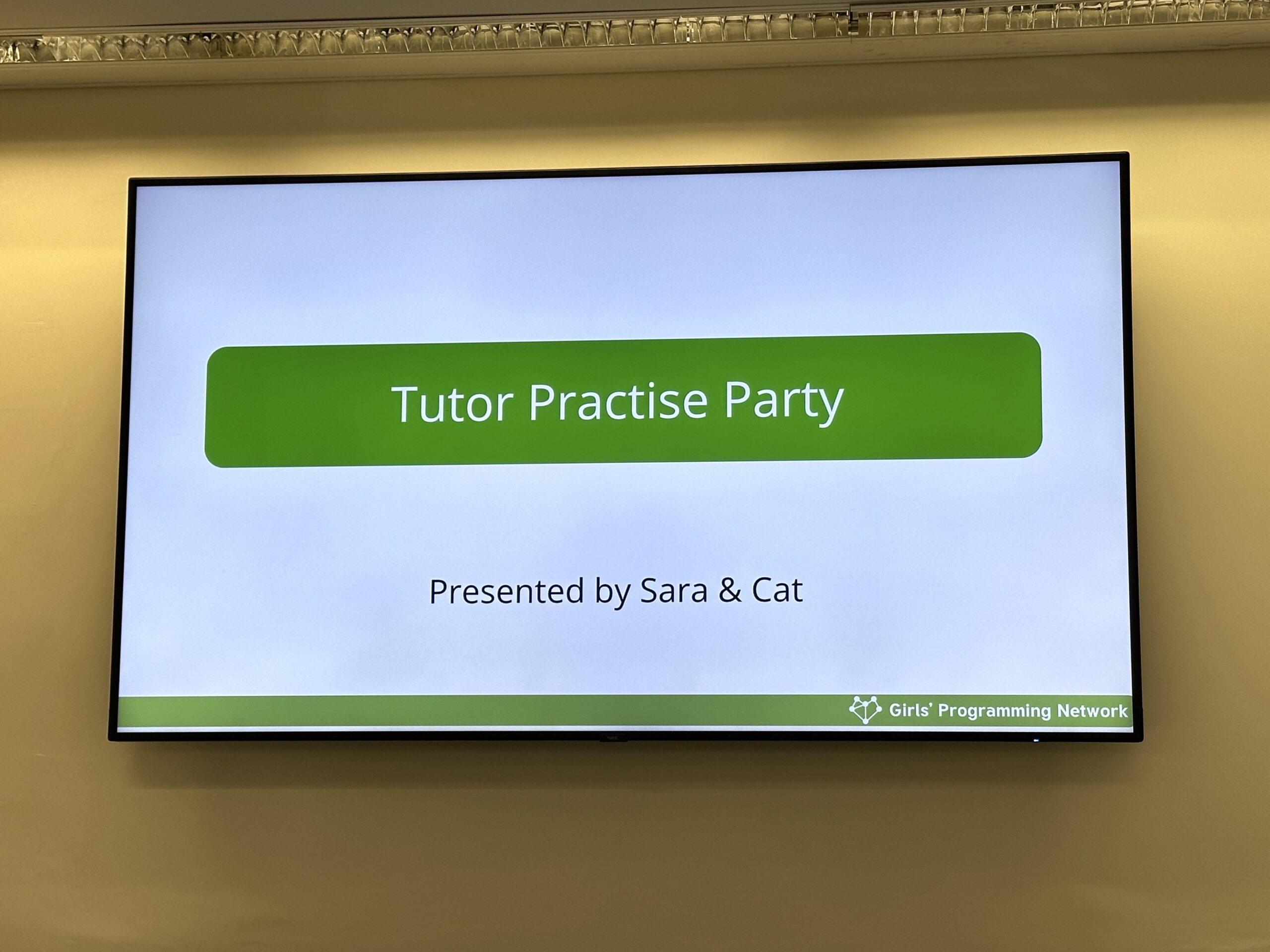 A slide on a television that says Tutor Practise Party