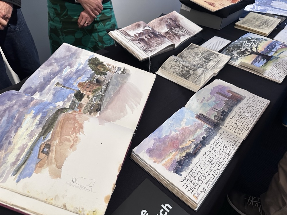 Artist sketchbooks showing drawings and watercolours of Sydney