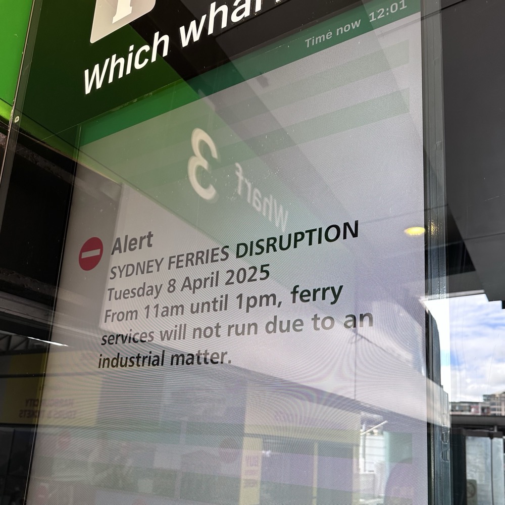 A sign at Circular Quay explaining that ferries are not running for 2 hours due to industrial action